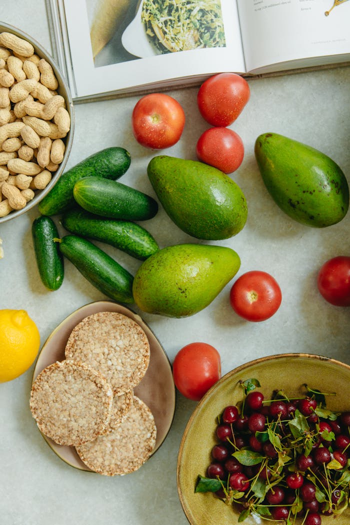 Top view of fruits, nuts, and snacks on a table, ideal for healthy eating concepts